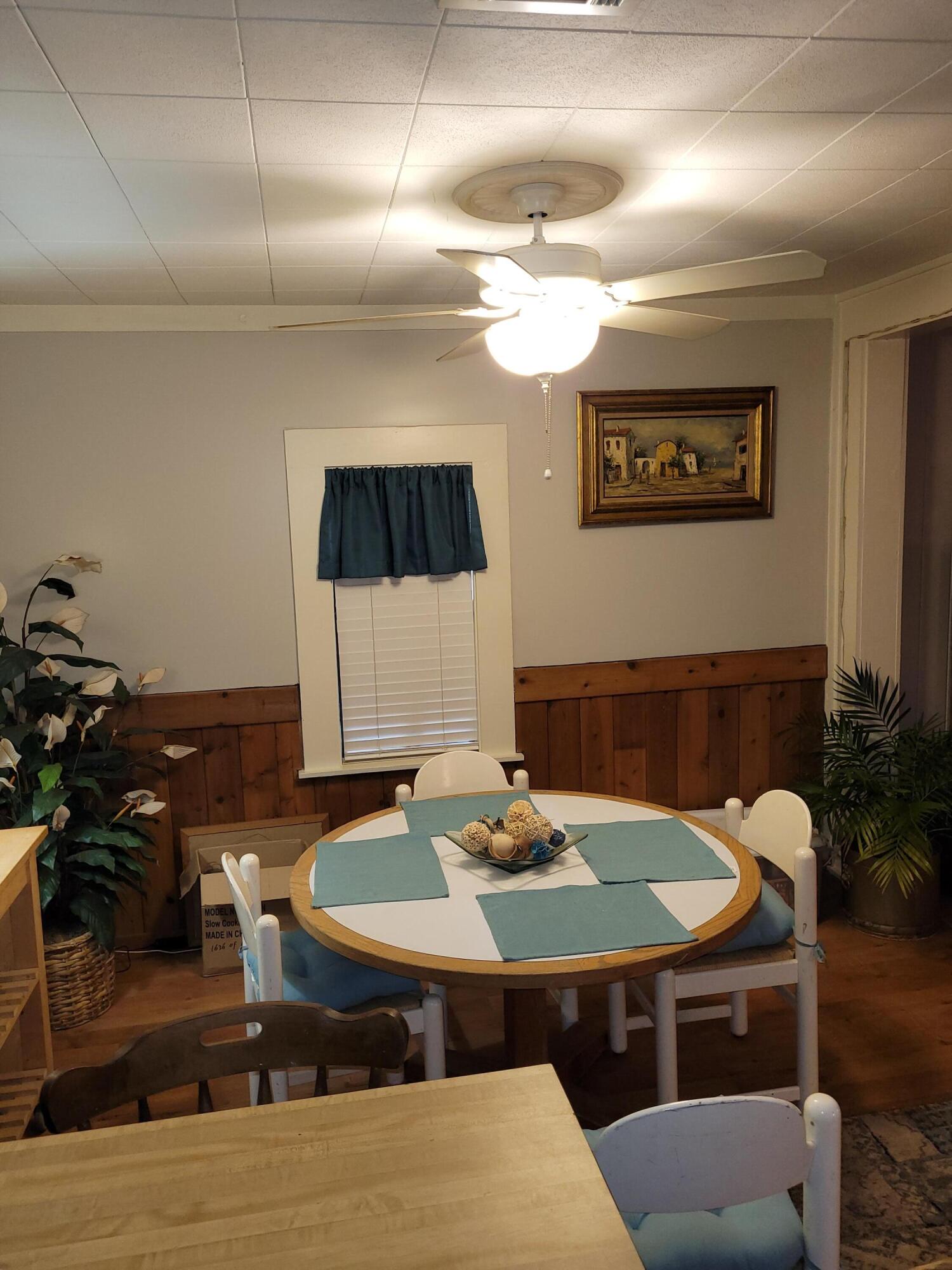 7363 Beaver Creek Road Baker, FL 32531 - Photo 20 of 29 a view of a dining room with furniture