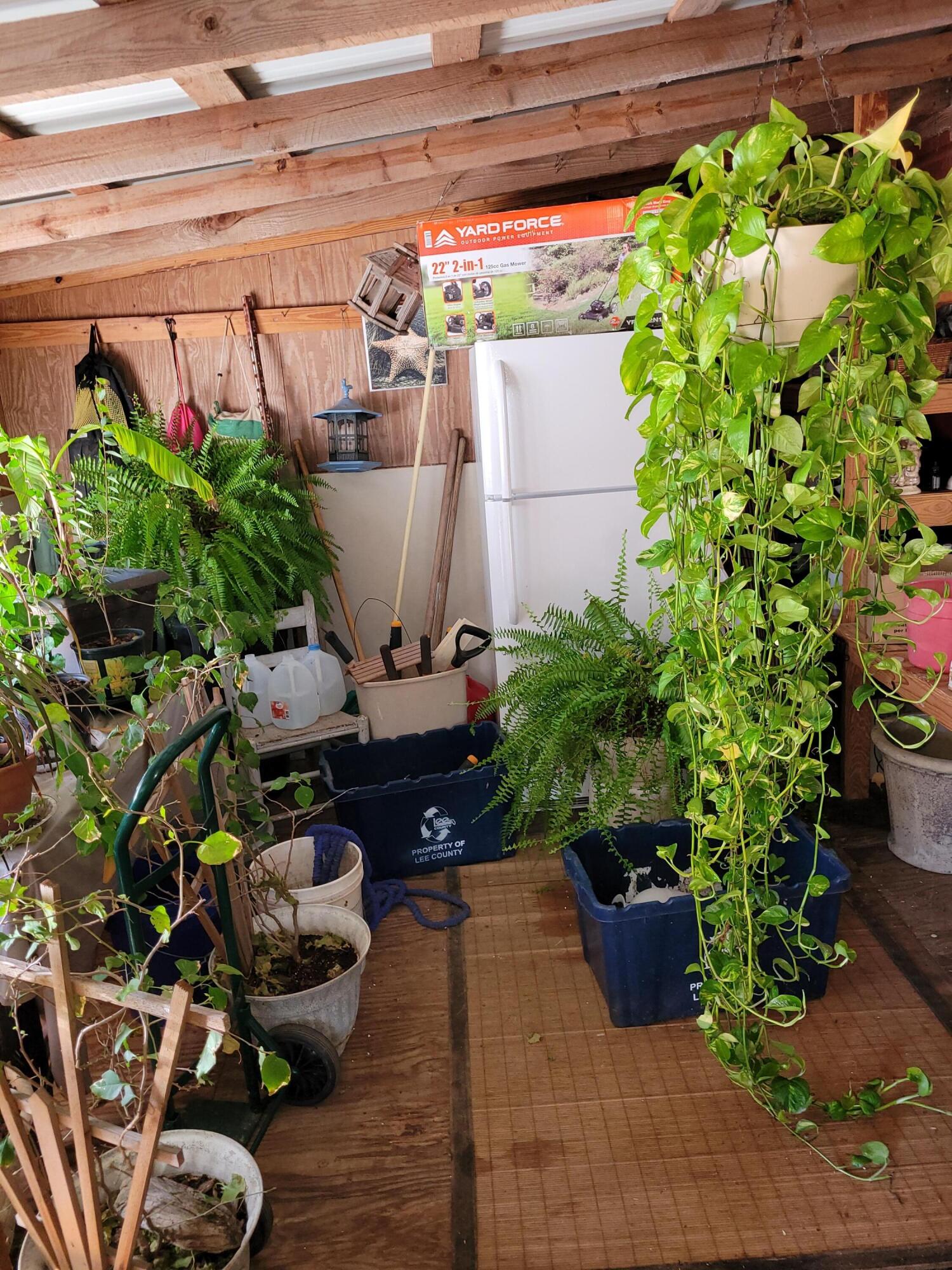 7363 Beaver Creek Road Baker, FL 32531 - Photo 24 of 29 a view of a backyard with plants and a patio