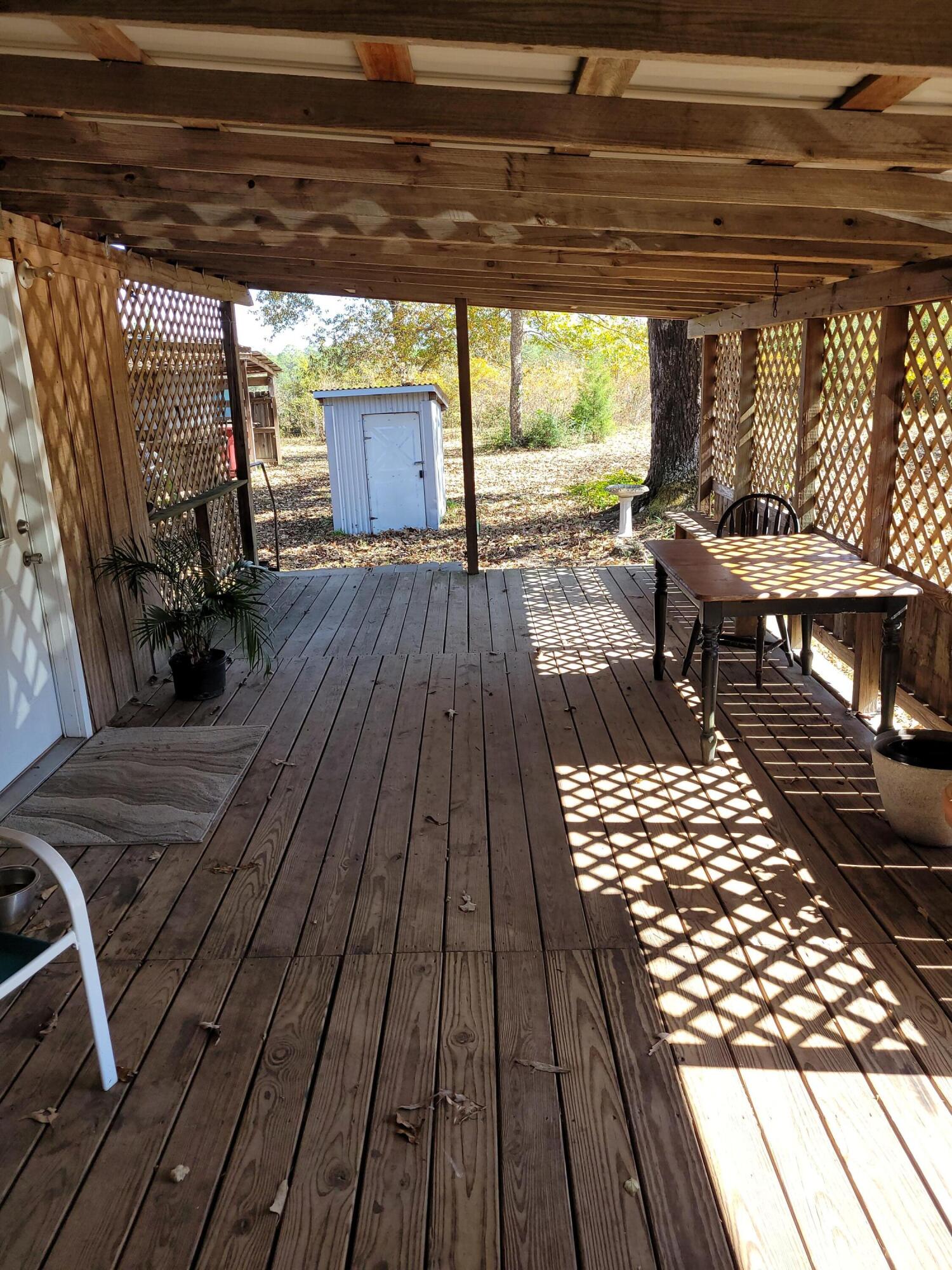 7363 Beaver Creek Road Baker, FL 32531 - Photo 4 of 29 a view of outdoor space with seating space