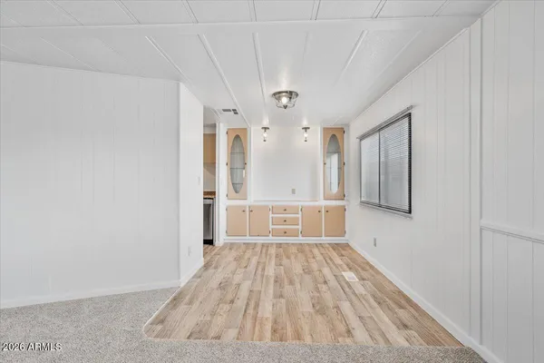 a view of a livingroom with wooden floor