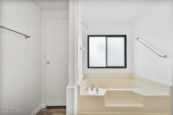a bathroom with a bathtub
