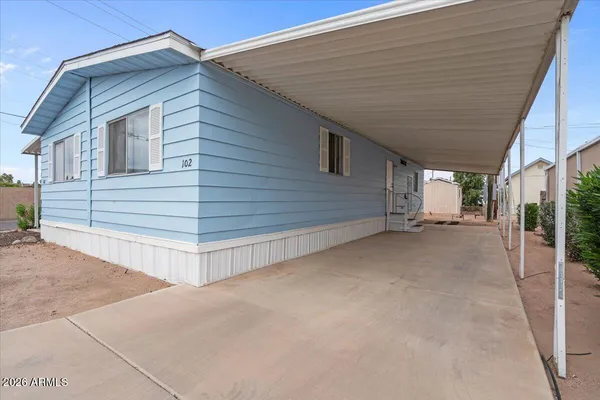 a view of a house with a garage