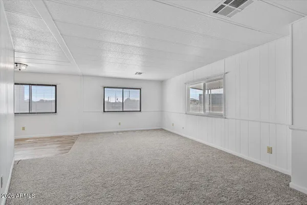 an empty room with windows