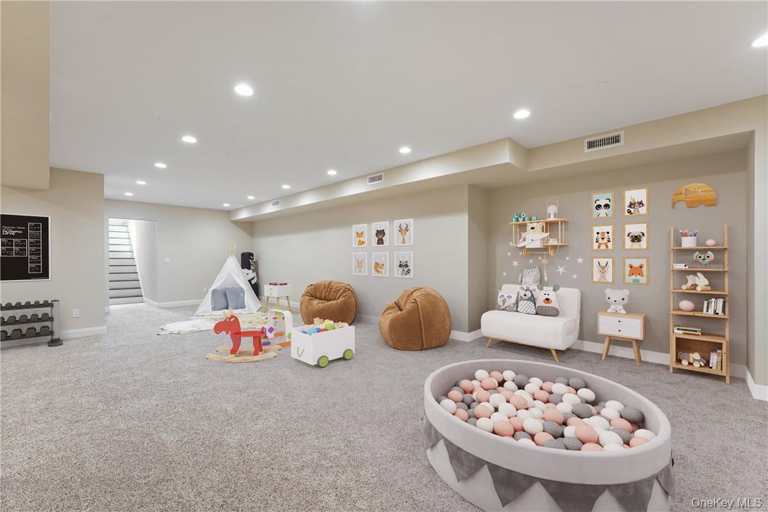 81 Spier Road Scarsdale, NY 10583 - Photo 25 of 32 Abundance of space in your lower level playroom
