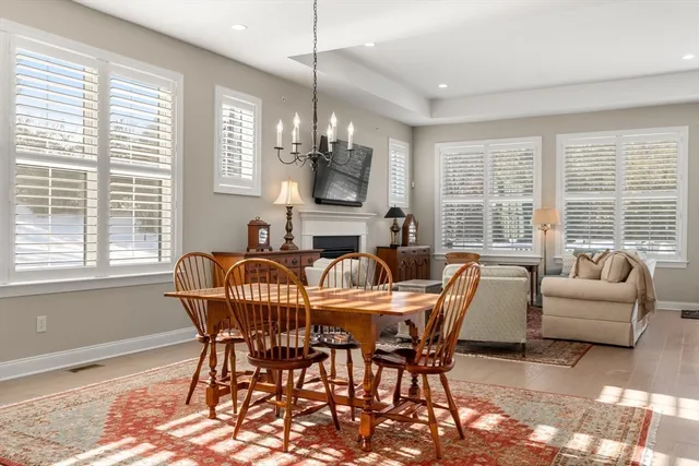 a view of a dining room with furniture window and outside view