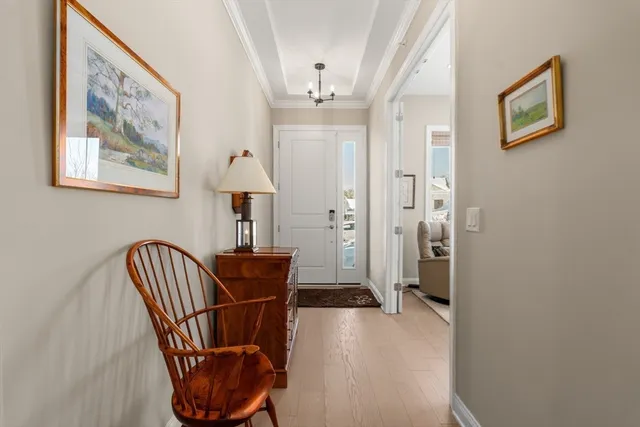 a view of a hallway with seating area