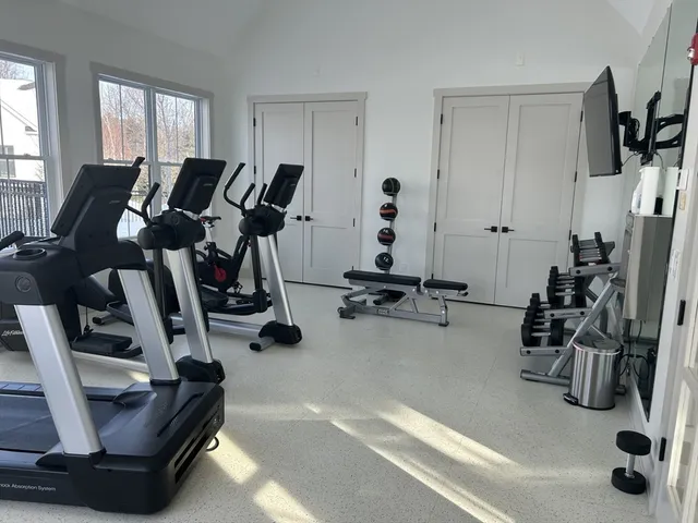 a view of a room with gym equipment