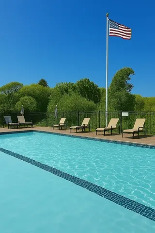 a view of a table and chairs in the garden