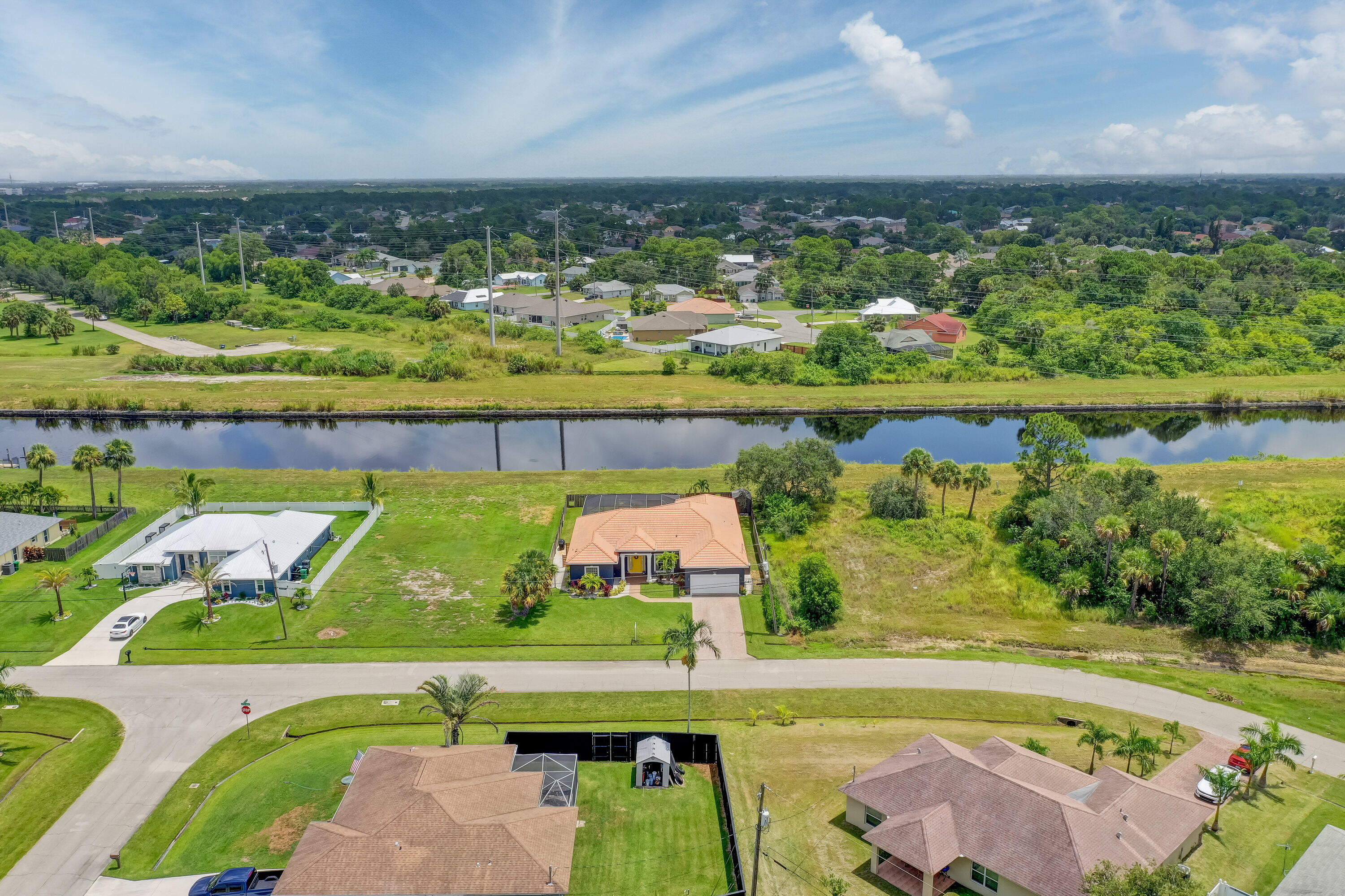 2207 Southwest Salmon Road Port St. Lucie, FL 34953 - Photo 4 of 38 aerial front from neighborhood
