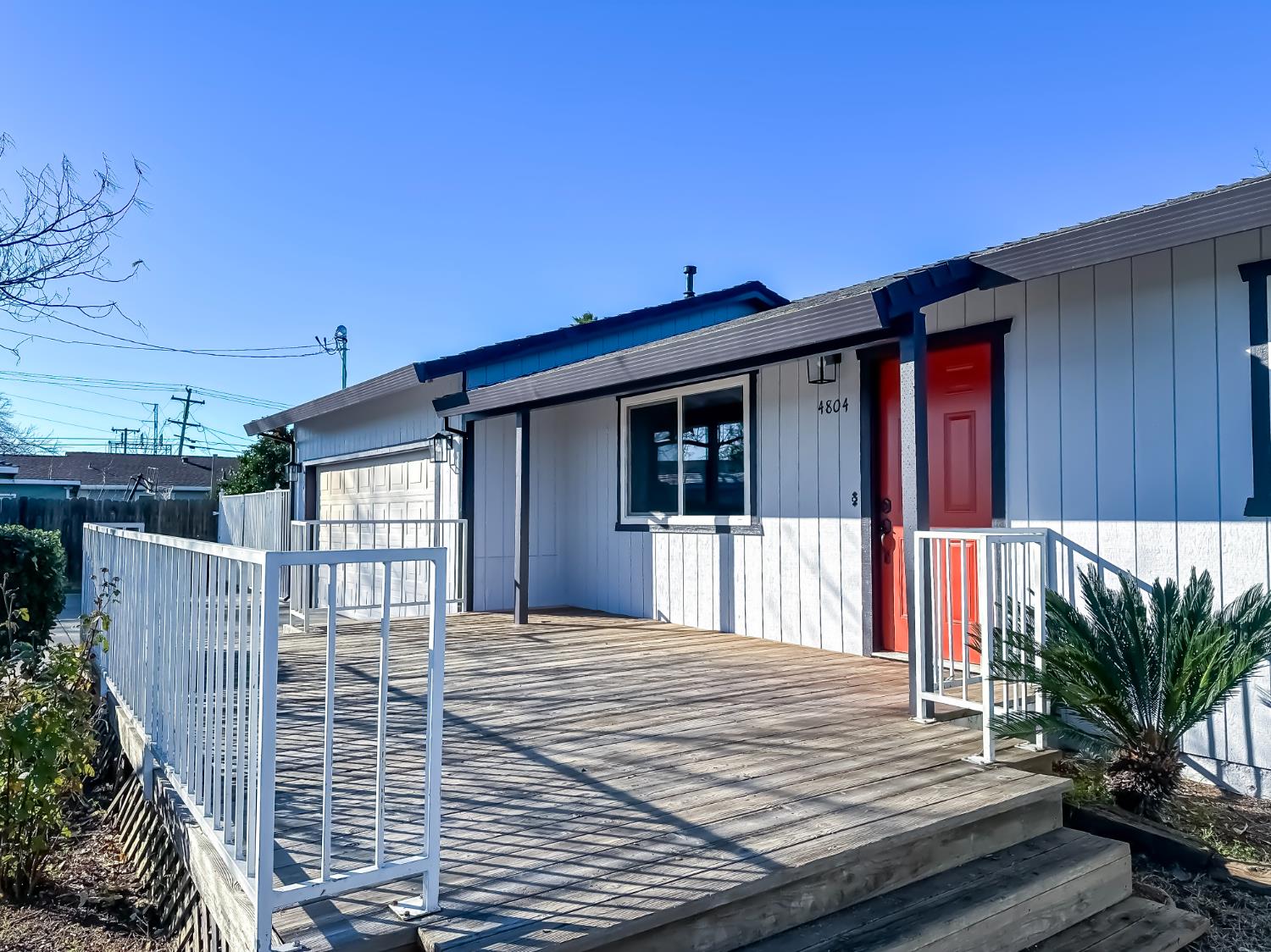 4804 Powerline Road Olivehurst, CA 95961 - Photo 12 of 65 a front view of a house with a wooden deck