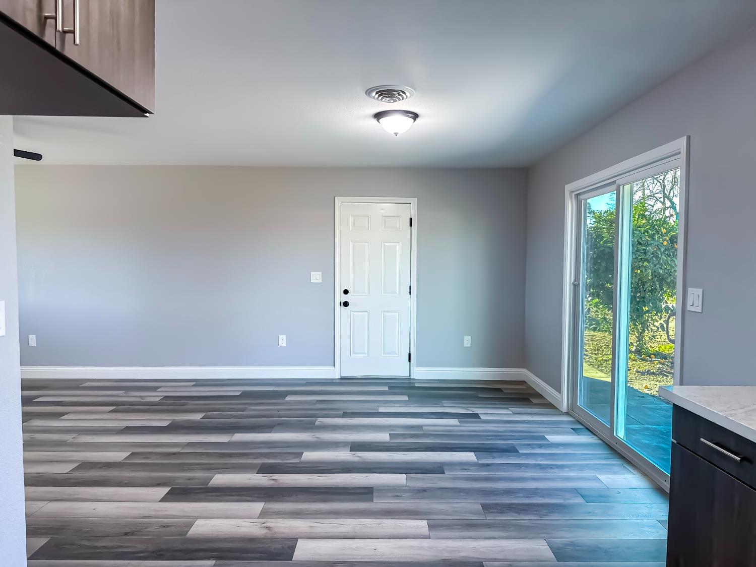 4804 Powerline Road Olivehurst, CA 95961 - Photo 23 of 65 a view of room with window and hardwood floor