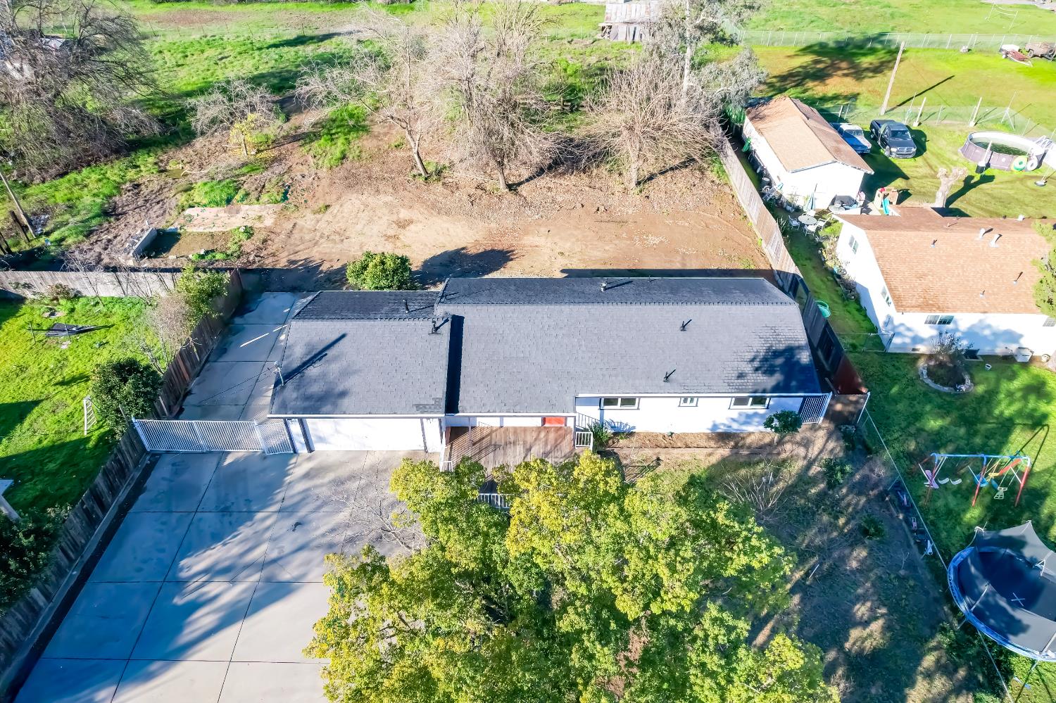 4804 Powerline Road Olivehurst, CA 95961 - Photo 58 of 65 an aerial view of a house with a yard