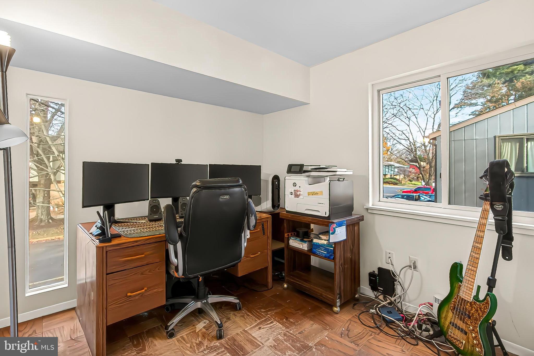 1809 Ivy Oak Square, Unit 61 Reston, VA 20190 - Photo 31 of 38 a view of workspace with wooden floor windows