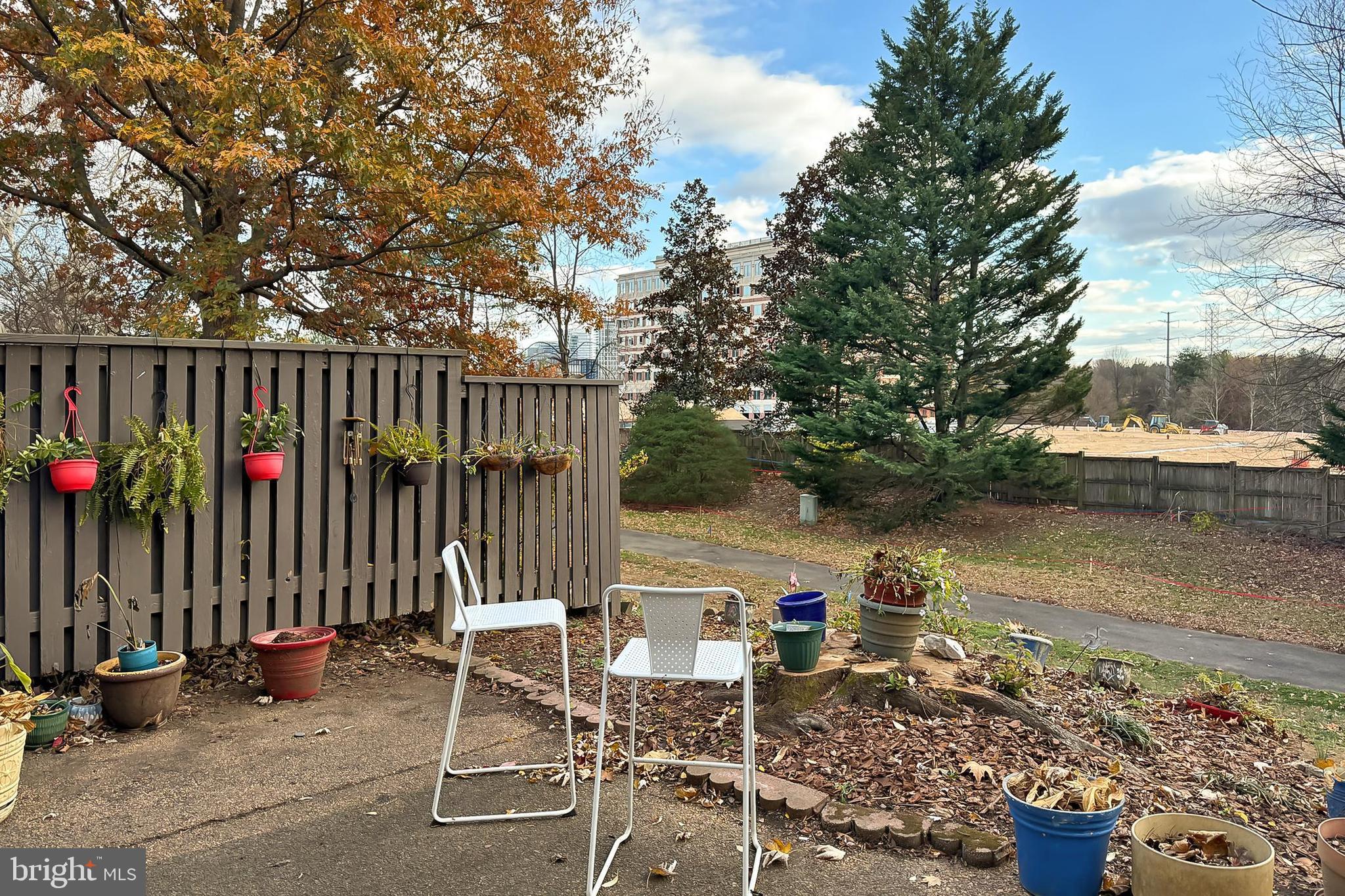 1809 Ivy Oak Square, Unit 61 Reston, VA 20190 - Photo 35 of 38 a view of a chairs and table in the patio