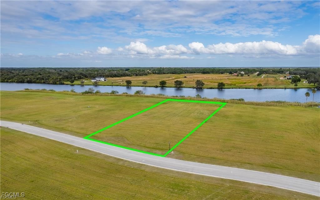 22797 Yellow Button Lane Alva, FL 33920 - Photo 5 of 13 a view of an ocean and city view