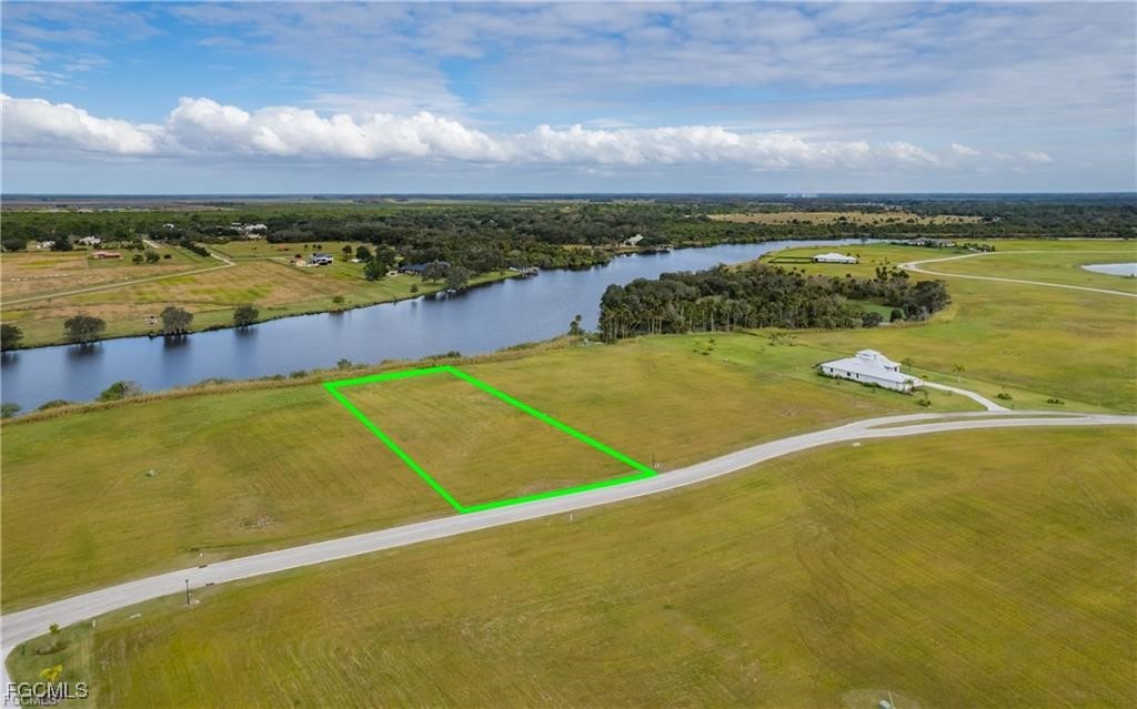 22797 Yellow Button Lane Alva, FL 33920 - Photo 6 of 13 a view of an outdoor space and yard