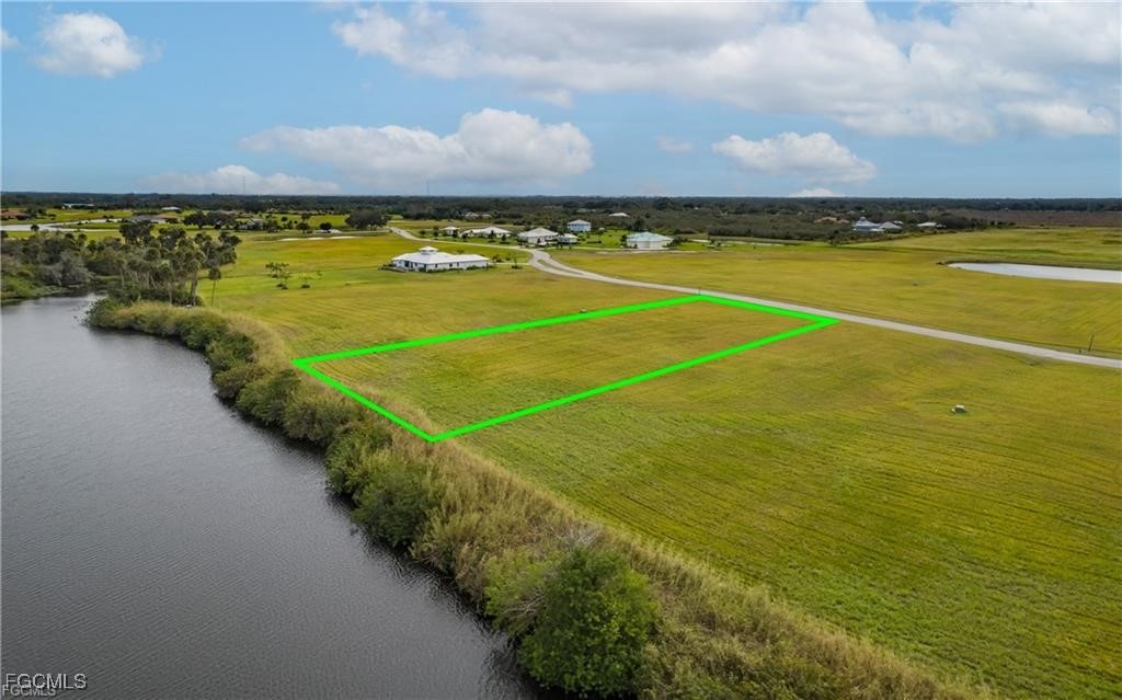 22797 Yellow Button Lane Alva, FL 33920 - Photo 9 of 13 a view of an outdoor space and yard