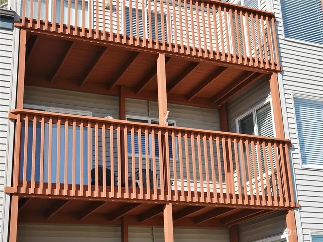a view of a porch with seating space