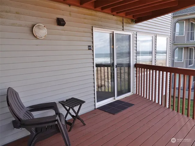 a view of wooden balcony with wooden floor