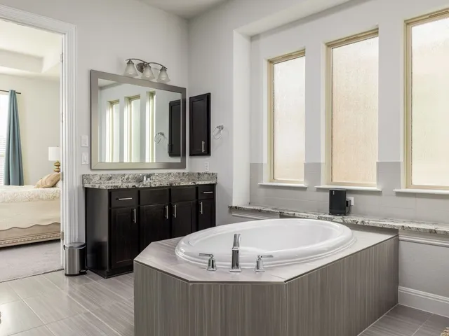 a room with gym equipment and a window