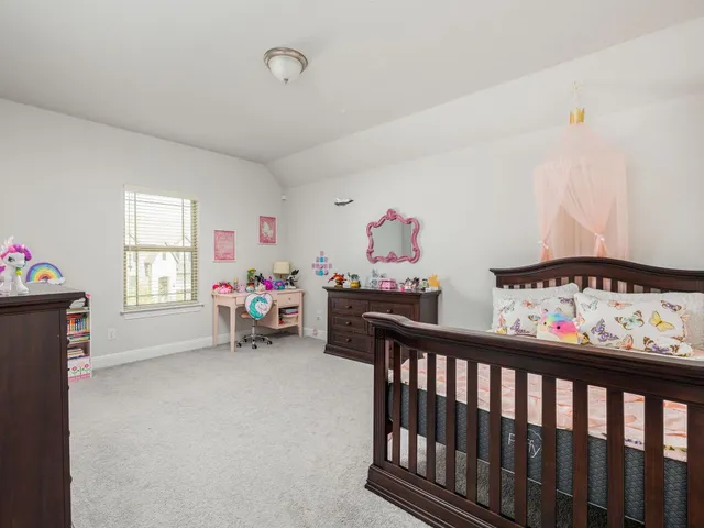 a bath room with a shower and a shower curtain