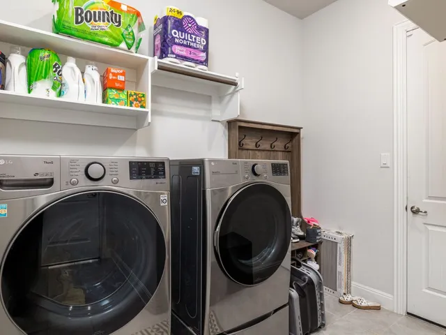 a view of a swimming pool with an outdoor seating