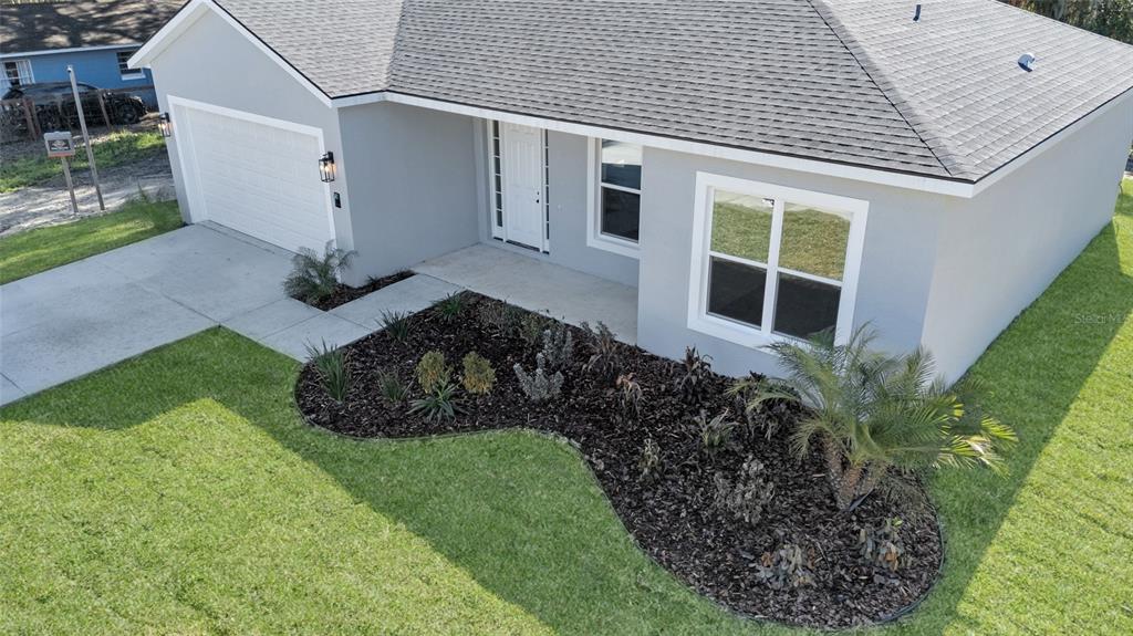 902 Southwest 2nd Street Ocala, FL 34471 - Photo 2 of 42 a view of a back yard of the house