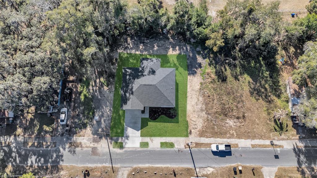 902 Southwest 2nd Street Ocala, FL 34471 - Photo 27 of 42 an aerial view of a house with garden space