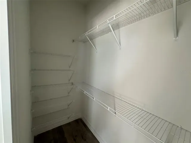 a utility room with sink dryer and washer