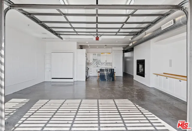 a bathroom with a sink toilet and a mirror
