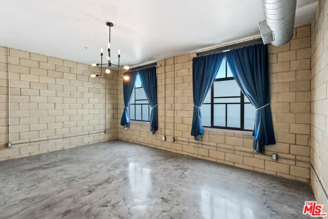 a view of a room with an empty space