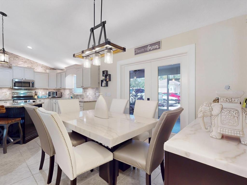 4775 Jay Drive St. Cloud, FL 34772 - Photo 11 of 49 a view of a dining room and livingroom