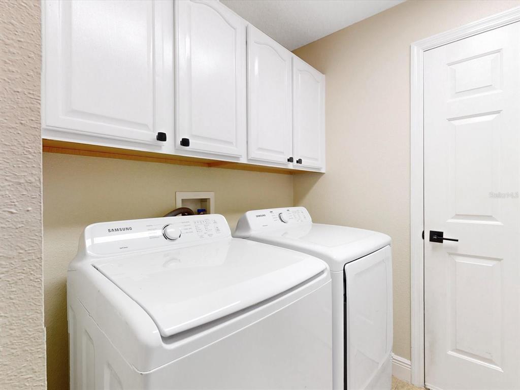 4775 Jay Drive St. Cloud, FL 34772 - Photo 23 of 49 a utility room with dryer and washer