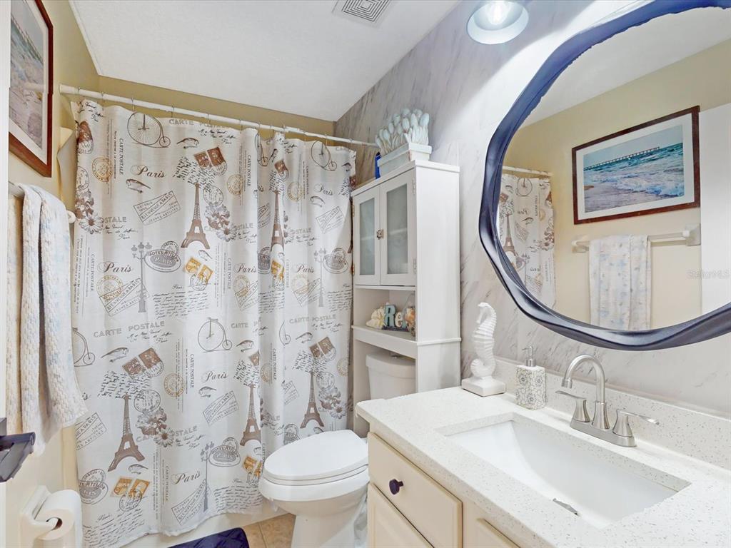 4775 Jay Drive St. Cloud, FL 34772 - Photo 27 of 49 a bathroom with a sink toilet and shower