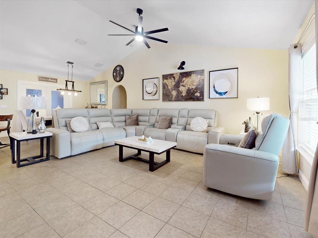 4775 Jay Drive St. Cloud, FL 34772 - Photo 3 of 49 a living room with furniture and a large window