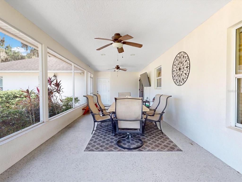 4775 Jay Drive St. Cloud, FL 34772 - Photo 31 of 49 a view of a dining room with furniture window and outside view