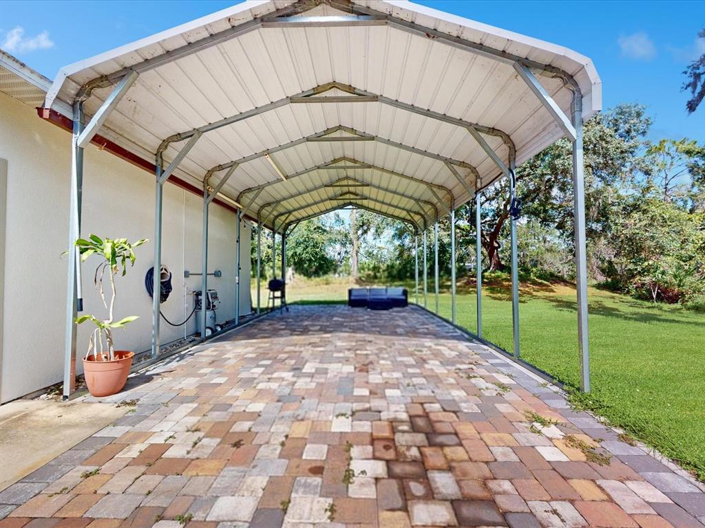 4775 Jay Drive St. Cloud, FL 34772 - Photo 41 of 49 a view of a entrance gate of the house