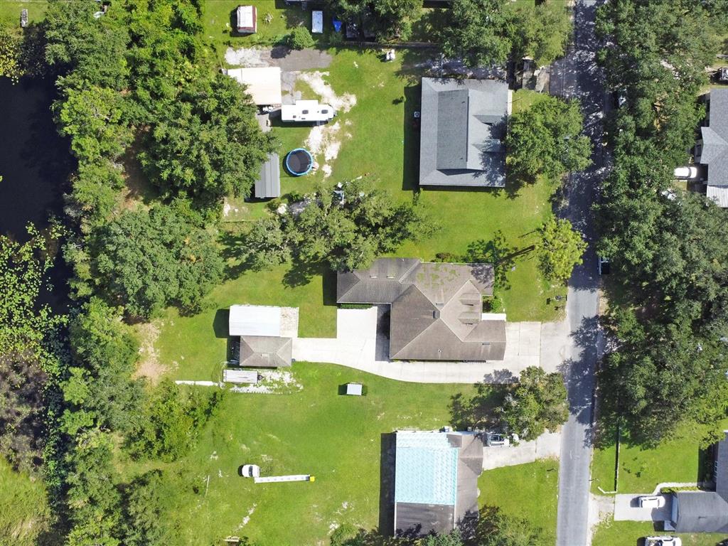 4775 Jay Drive St. Cloud, FL 34772 - Photo 48 of 49 an aerial view of a house with a yard