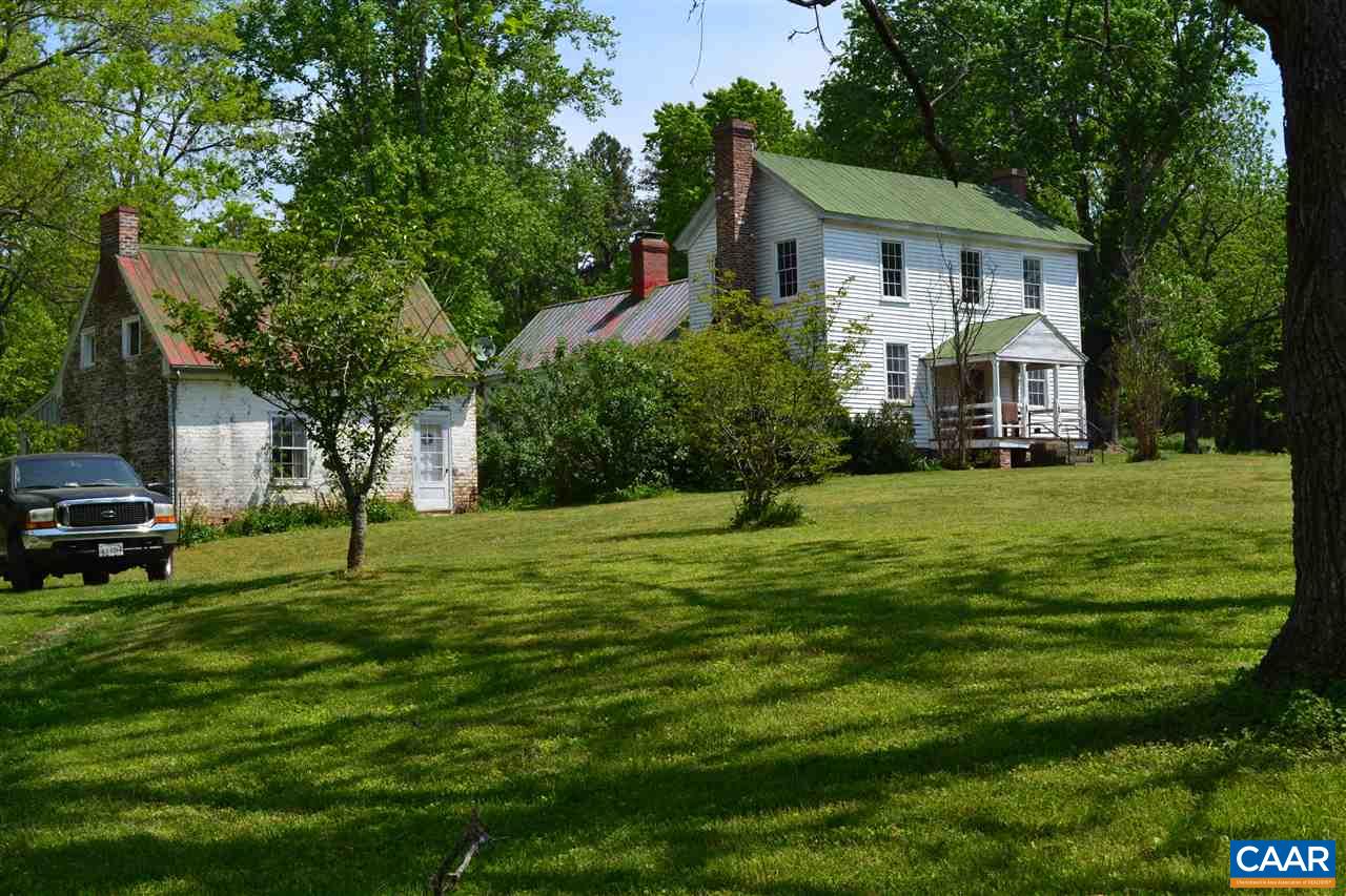 1400 Forest Clay Road Wingina, VA 24599 - Photo 1 of 19 a front view of a house with a yard