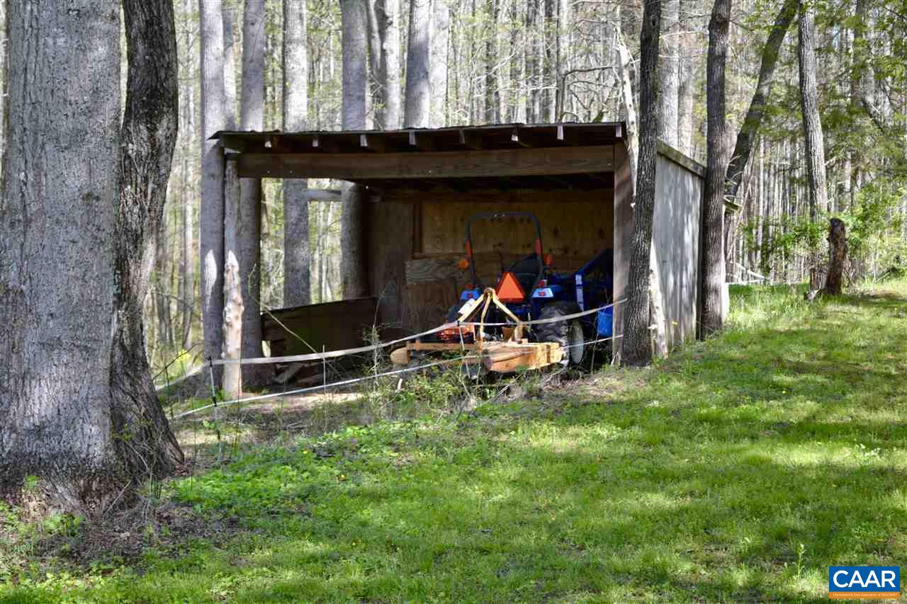 1400 Forest Clay Road Wingina, VA 24599 - Photo 13 of 19 a view of a backyard with sitting area and furniture