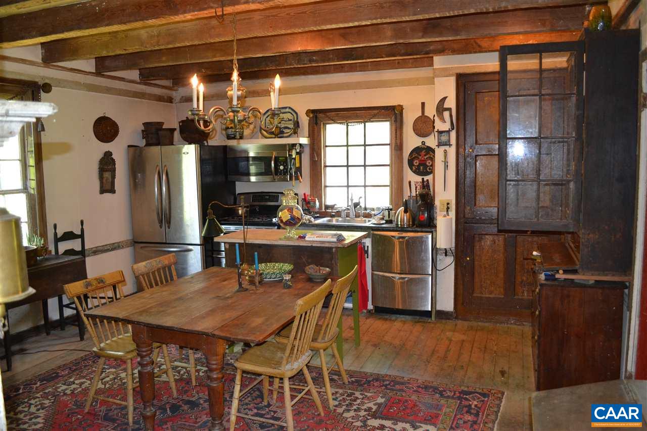 1400 Forest Clay Road Wingina, VA 24599 - Photo 18 of 19 a kitchen with a table and chairs in it