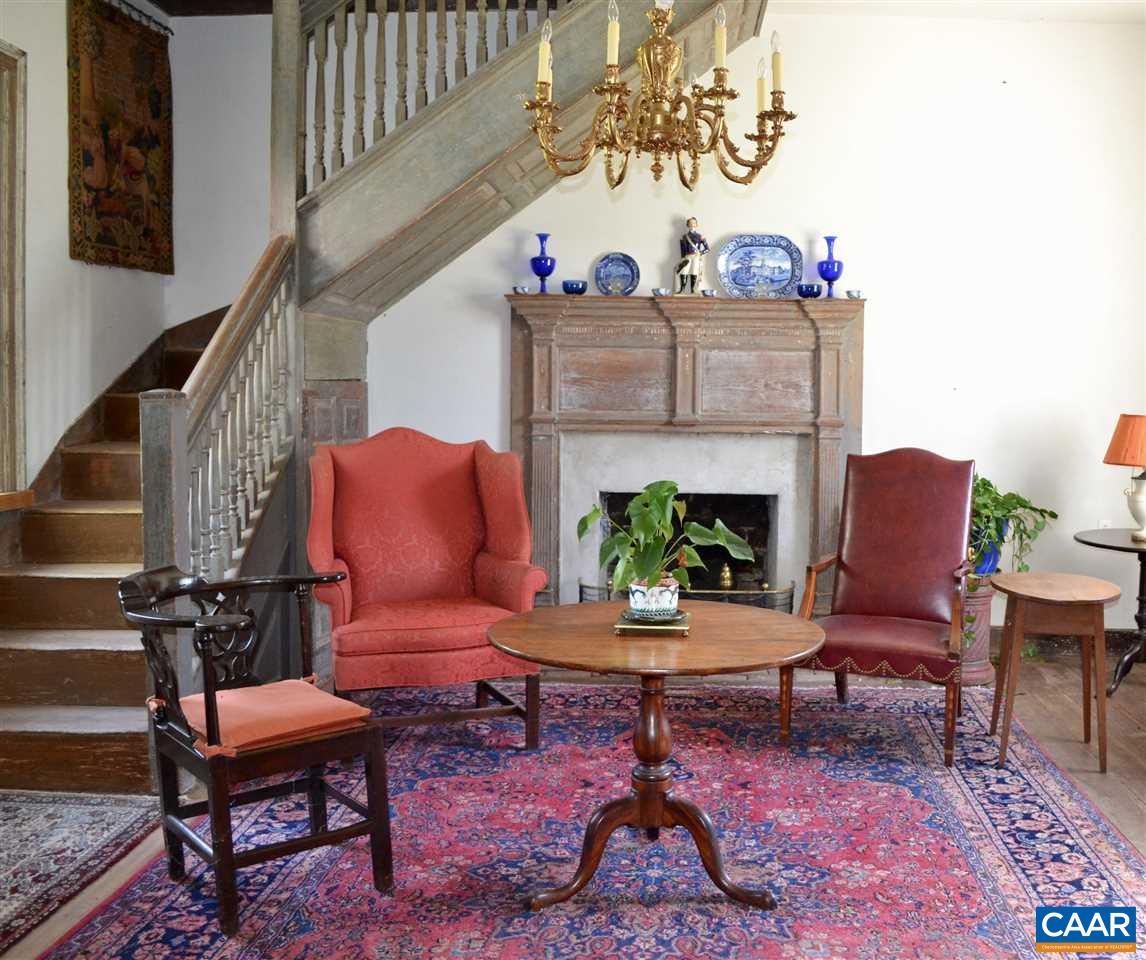 1400 Forest Clay Road Wingina, VA 24599 - Photo 2 of 19 a living room with furniture and a fireplace