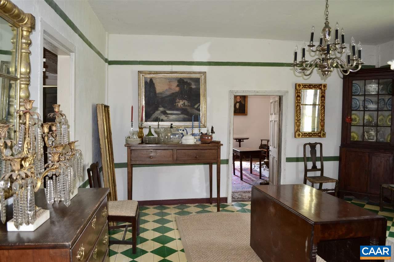 1400 Forest Clay Road Wingina, VA 24599 - Photo 3 of 19 a living room with fireplace furniture and a chandelier
