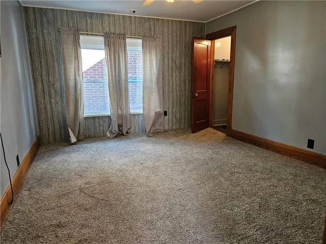 an empty room with windows