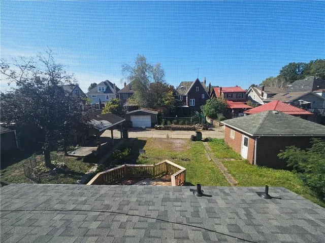 a view of a water fountain in front of the house