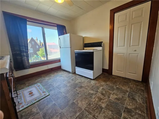 a view of livingroom with washer and dryer