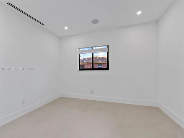 a kitchen with a stove and a sink