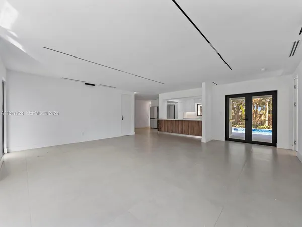 a view of a livingroom with furniture and cabinet