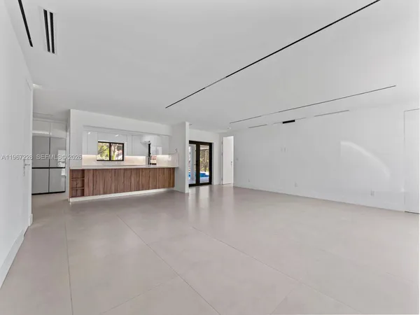 a view of a room with racks on the wall