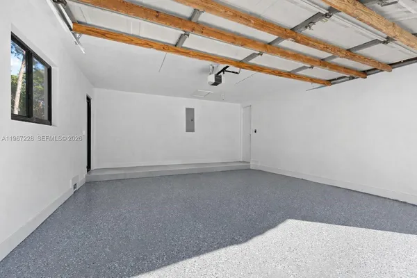 a view of house with backyard and garden